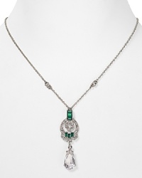 Timeless beauty from Carolee, this dressed up necklace features a delicate crystal-adorned pendant which hangs from a simple silvery chain. Timeless beauty from Carolee, this dressed up necklace features a delicate crystal-adorned pendant which hangs from a simple silvery chain.