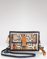 Textured watersnake is an exotic touch on this Isabella Fiore crossbody. But it is the bag's petite, day-to-night-perfect proportions that truly tip the scales. Textured watersnake is an exotic touch on this Isabella Fiore crossbody. But it is the bag's petite, day-to-night-perfect proportions that truly tip the scales.
