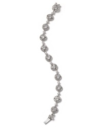 Always have something glamourous up your sleeve with this crystal and rhodium-plated bracelet from Nadri, sure to add a sophisticated dose of sparkle to evening ensembles. Always have something glamourous up your sleeve with this crystal and rhodium-plated bracelet from Nadri, sure to add a sophisticated dose of sparkle to evening ensembles.