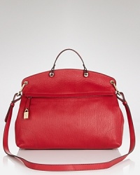 This Furla satchel interprets the top handle handbag trend in understated style, crafted of rich leather with a streamlined yet sophisticated shape. This Furla satchel interprets the top handle handbag trend in understated style, crafted of rich leather with a streamlined yet sophisticated shape.