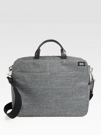The ultimate travel brief, this bag designed from technical bonded oxford fabric, repels water with ease. It is also TSA approved to pass through airport security without removing a laptop or tablet. Additional functionality includes interior zip pockets and a flap that allows you to fit this style onto the handle of any roller bag.Zip closureDouble top handlesAdjustable shoulder strapTechnical oxford fabric13W x 16H x 4HImported The ultimate travel brief, this bag designed from technical bonded oxford fabric, repels water with ease. It is also TSA approved to pass through airport security without removing a laptop or tablet. Additional functionality includes interior zip pockets and a flap that allows you to fit this style onto the handle of any roller bag.Zip closureDouble top handlesAdjustable shoulder strapTechnical oxford fabric13W x 16H x 4HImported