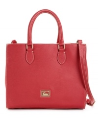 Dooney & Bourke's smart Janine purse sports a beautiful, boxy silhouette. Dooney & Bourke's smart Janine purse sports a beautiful, boxy silhouette.
