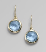 From the Lollipop Collection. Exquisitely faceted blue topaz drops, framed in gleaming 18k yellow gold. Blue topaz 18k yellow gold Drop, about 1 Diameter, about ½ Ear wire Imported