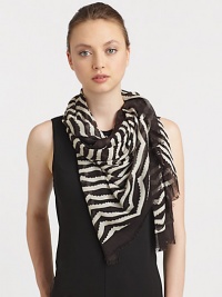 A lightweight design with a fringed edge in a fun print. ViscoseAbout 28 X 69Dry cleanImported A lightweight design with a fringed edge in a fun print. ViscoseAbout 28 X 69Dry cleanImported