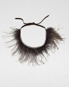 Luxurious, playful ostrich feathers, secured with a ribbon tie.Circumfrence, 8Ostrich feathersMade in Italy of imported fabric