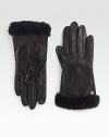 Supple leather accented with luxurious cashmere lining, shearling sheepskin cuff and touch technology for easy access to touchscreen electronics.About 9 longCashmere liningShearling cuffProfessional leather cleanerImported