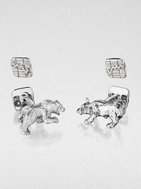 Shiny sterling silver cuff links in a moneyed bull & bear design.Sterling silverAbout .87 diam.Made in USA Shiny sterling silver cuff links in a moneyed bull & bear design.Sterling silverAbout .87 diam.Made in USA