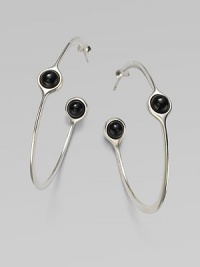 A sleek and modern piece with smooth black agate set in sterling silver. Black agateSterling silverLength, about 1¾Post backImported 