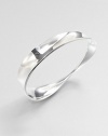 From the Moebius Collection. An endless concave bangle of gleaming sterling silver with an intriguing twist that gives it its name.Sterling silverDiameter, about 2½Imported