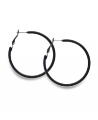 Non-traditional hoops make a bold, style statement. Style&co. earrings crafted in black enamel over mixed metal for a look that will turn heads. Approximate diameter: 1-1/2 inches. Non-traditional hoops make a bold, style statement. Style&co. earrings crafted in black enamel over mixed metal for a look that will turn heads. Approximate diameter: 1-1/2 inches.
