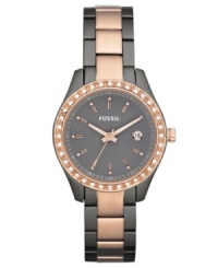 Surrounded by shimmering crystal accents, this elegant yet casual Stella watch from Fossil brings a wonderful change-of-pace to your daily look. Surrounded by shimmering crystal accents, this elegant yet casual Stella watch from Fossil brings a wonderful change-of-pace to your daily look.