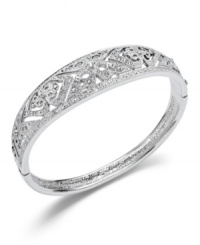 Prepare for an evening of elegance. Charter Club's sparkling accessory features an intricate filigree pattern with sparkling glass accents. Crafted in silver tone mixed metal. Item comes packaged in a signature gift box. Approximate diameter: 2-1/2 inches.