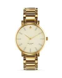 A classic watch design from kate spade new york is oh so rich in gold plated metal. A bold linked bracelet and milky face add an extra stroke of polish. A classic watch design from kate spade new york is oh so rich in gold plated metal. A bold linked bracelet and milky face add an extra stroke of polish.