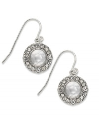 Crystal sophistication. These stud earrings from Lauren Ralph Lauren offer a classic look with a faceted crystal accent surrounded by glistening details. Crafted in rhodium-plated brass. Approximate drop: 1/2 inch. Approximate diameter: 1/2 inch. Crystal sophistication. These stud earrings from Lauren Ralph Lauren offer a classic look with a faceted crystal accent surrounded by glistening details. Crafted in rhodium-plated brass. Approximate drop: 1/2 inch. Approximate diameter: 1/2 inch.
