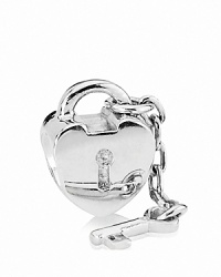 This classic PANDORA charm features a heart-shaped lock and dangling key, adding eye-catching movement to your bracelet. This classic PANDORA charm features a heart-shaped lock and dangling key, adding eye-catching movement to your bracelet.