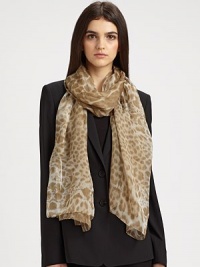 A glamourous design featuring luxurious cashmere with a chic leopard and poppy print. CashmereAbout 27½ X 78¾Dry cleanMade in Italy A glamourous design featuring luxurious cashmere with a chic leopard and poppy print. CashmereAbout 27½ X 78¾Dry cleanMade in Italy