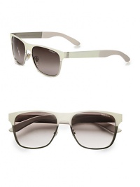 This contemporary, steel design features a flat metal frame with rubber temple tips. Available in semi-matte black with brown gradient lens and matte white with brown gradient lens. Logo accented temples100% UV protectionMade in Italy This contemporary, steel design features a flat metal frame with rubber temple tips. Available in semi-matte black with brown gradient lens and matte white with brown gradient lens. Logo accented temples100% UV protectionMade in Italy