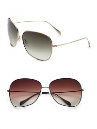 Ultra lightweight titanium with signature logo at temple end. Available in gold with olive gradient lens or walnut with spice brown lens. 100% UV protection Imported Ultra lightweight titanium with signature logo at temple end. Available in gold with olive gradient lens or walnut with spice brown lens. 100% UV protection Imported
