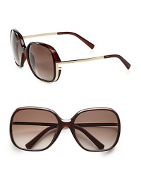A modern, plastic style with creative metal logo end pieces and temples. Available in black with grey gradient lens or dark brown with brown gradient lens. Logo temples100% UV protectionMade in Italy A modern, plastic style with creative metal logo end pieces and temples. Available in black with grey gradient lens or dark brown with brown gradient lens. Logo temples100% UV protectionMade in Italy