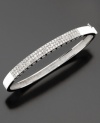 Frost your wrist with this sparkling diamond bracelet. Round-cut diamonds (1-1/2 ct. t.w.) are set pavé-style in 14k white gold.
