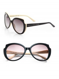 A unique, plastic style with cut-out corners. Available in black with brown gradient lens. Logo temples100% UV protectionImported A unique, plastic style with cut-out corners. Available in black with brown gradient lens. Logo temples100% UV protectionImported