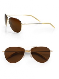 A stylish design with a sleek double bridge detail. Available in gold with java polar lens. Silicone details100% UV protectionImported A stylish design with a sleek double bridge detail. Available in gold with java polar lens. Silicone details100% UV protectionImported