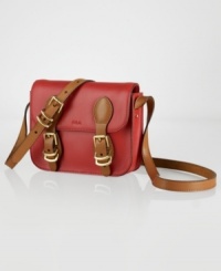 Embrace exquisite, easygoing style with this practical-chic crossbody from Lauren Ralph Lauren. Crafted from supple leather and accented with gleaming golden hardware, it flaunts multiple pockets for effortless go-anywhere accessorizing. Embrace exquisite, easygoing style with this practical-chic crossbody from Lauren Ralph Lauren. Crafted from supple leather and accented with gleaming golden hardware, it flaunts multiple pockets for effortless go-anywhere accessorizing.