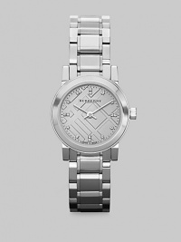 A sleek stainless steel design that features an iconic check dial with diamond markers. Quartz movementWater resistant to 5 ATMRound stainless steel case, 26mm (1)Smooth bezelSilvertone check dialSixteen diamond hour markersStainless steel link braceletMade in Switzerland A sleek stainless steel design that features an iconic check dial with diamond markers. Quartz movementWater resistant to 5 ATMRound stainless steel case, 26mm (1)Smooth bezelSilvertone check dialSixteen diamond hour markersStainless steel link braceletMade in Switzerland
