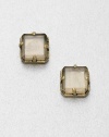 A simply chic piece with a faceted cube bead set in a goldtone setting. EpoxyGoldtone brassSize, about .59Post backImported 