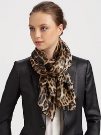 A wildly fashionable leopard print and metallic signature adds unmistakable style to a silk blend scarf.70% silk/30% nylonAbout 70 X 180Dry cleanMade in Italy