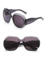 These mid-sized, acetate frames are the perfect accessory to any outfit. Available in smoke with dark grey lens. Logo temples100% UV protectionMade in Italy These mid-sized, acetate frames are the perfect accessory to any outfit. Available in smoke with dark grey lens. Logo temples100% UV protectionMade in Italy