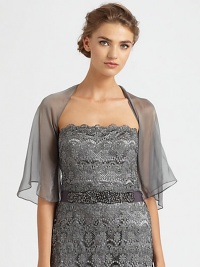 Gauzy silk chiffon, in an elegant flutter-sleeve silhouette.Open frontElbow-length flutter sleevesSilkDry cleanImportedModel shown is 5'11 (180cm) wearing US size 4. Gauzy silk chiffon, in an elegant flutter-sleeve silhouette.Open frontElbow-length flutter sleevesSilkDry cleanImportedModel shown is 5'11 (180cm) wearing US size 4.