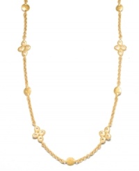 Rich, luxurious layers that can be worn long or doubled up. This chic Lauren Ralph Lauren necklace features intricate hammered discs in worn gold tone mixed metal. Approximate length: 60 inches. Rich, luxurious layers that can be worn long or doubled up. This chic Lauren Ralph Lauren necklace features intricate hammered discs in worn gold tone mixed metal. Approximate length: 60 inches.