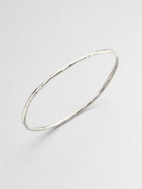A simply chic style in hammered sterling silver, perfect for stacking. Sterling silverDiameter, about 2.5Slip-on styleImported A simply chic style in hammered sterling silver, perfect for stacking. Sterling silverDiameter, about 2.5Slip-on styleImported