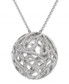 This elaborately crafted, spherical pendant is inspired by delicate flower petals. Sparkling in clear crystal pavé, this Swarovski pendant comes on a rhodium-plated mixed metal chain and lends a modern, sophisticated note to any outfit. Approximate length: 23 inches. Approximate drop: 1-1/4 inches.