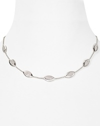 A focal point of pavé-framed crystals impart elegant geometry to this Nadri necklace, resplendent in rhodium plated metal. A focal point of pavé-framed crystals impart elegant geometry to this Nadri necklace, resplendent in rhodium plated metal.