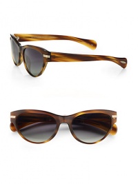 This retro style is handcrafted in shiny acetate. Available in sandalwood with green gradient polar lens. Ridged end-piece detail100% UV protectionImported 