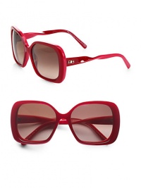 Artfully twisted temples and oversized square frames give this chic design a retro appeal. Available in fuchsia with brown gradient lenses and black with grey gradient lens .Logo accented temples100% UV protectionMade in Italy Artfully twisted temples and oversized square frames give this chic design a retro appeal. Available in fuchsia with brown gradient lenses and black with grey gradient lens .Logo accented temples100% UV protectionMade in Italy