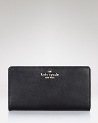 kate spade new york's leather wallet is a city-sleek purse companion. Slip it inside a structured tote to keep the urban essentials at an arm's length. kate spade new york's leather wallet is a city-sleek purse companion. Slip it inside a structured tote to keep the urban essentials at an arm's length.