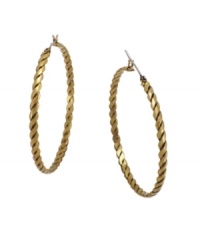 Tie up all the loose ends in this stylish rope design by BCBGeneration. A chic, twisted design shines in rich antique gold tone mixed metal. Approximate diameter: 1-1/2 inches. Tie up all the loose ends in this stylish rope design by BCBGeneration. A chic, twisted design shines in rich antique gold tone mixed metal. Approximate diameter: 1-1/2 inches.