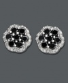 Expect the unexpected. Add a dash of understated drama with these stud earrings featuring a cluster of round-cut black diamond (3/4 ct. t.w.) encircled by white diamond (1/5 ct. t.w.). Set in sterling silver. Approximate diameter: 1/3 inch.