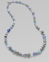 From the Elements Collection. A long-enough-to-double strand combines beads of sterling silver, blue chalcedony, aquamarine and moon quartz in an artful array of textures, sizes and shades.Blue chalcedony, aquamarine and moon quartzSterling silverLength, about 36Cable toggle claspImported