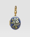 Sapphire-colored CRYSTALLIZED - Swarovski Elements sparkle on this handcrafted, hand-enameled birthstone locket that opens to hold a favorite photo. Crystal Enamel 18k goldplated brass & brass-plated pewter Month indicated on the back Length, about 1¼ Width, about 1 Spring clip clasp Made in USA