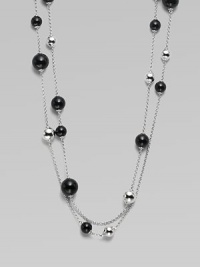 A very long, delicate piece with beautiful round black agate and contrasting sterling silver stations on a link chain, perfect for wearing doubled. Black agateSterling silverLength, about 51Clasp closureImported A very long, delicate piece with beautiful round black agate and contrasting sterling silver stations on a link chain, perfect for wearing doubled. Black agateSterling silverLength, about 51Clasp closureImported