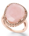 Pink polish. This beautiful statement ring features an asymmetrical pink opal (10-3/4 ct. t.w.) that pops against a sparkling diamond frame (1/4 ct. t.w.). Set in 14k rose gold over sterling silver. Size 7.