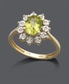 Create an eye-catching effect in this gleaming, green ring. An oval-cut peridot (1-1/3 ct. t.w.) is highlighted by a ring of round-cut diamond accents. Crafted in 14k gold and 14k gold with rhodium plating.