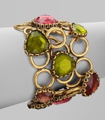 An unique style with brightly colored, hand-poured resin cabochons set atop a fused open ring bracelet. Resin stonesBrass and pewterLength, about 7½Toggle closureMade in USA