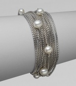 From the Pearl Collection. Multiple rows of sterling silver box chains with a random array of pearls.Pearl Sterling silver Length, about 7½ Push lock clasp closure Imported 