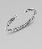 From the Color Classic Collection. A signature Yurman cable of sterling silver, richly enhanced by bands of pavé diamonds, encircling the end caps. Diamonds, 0.09 tcw Sterling silver Cable, 5mm Diameter, about 2½ Made in USA