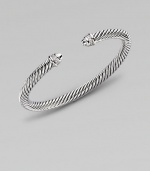 From the Color Classic Collection. A signature Yurman cable of sterling silver, richly enhanced by bands of pavé diamonds, encircling the end caps. Diamonds, 0.09 tcw Sterling silver Cable, 5mm Diameter, about 2½ Made in USA